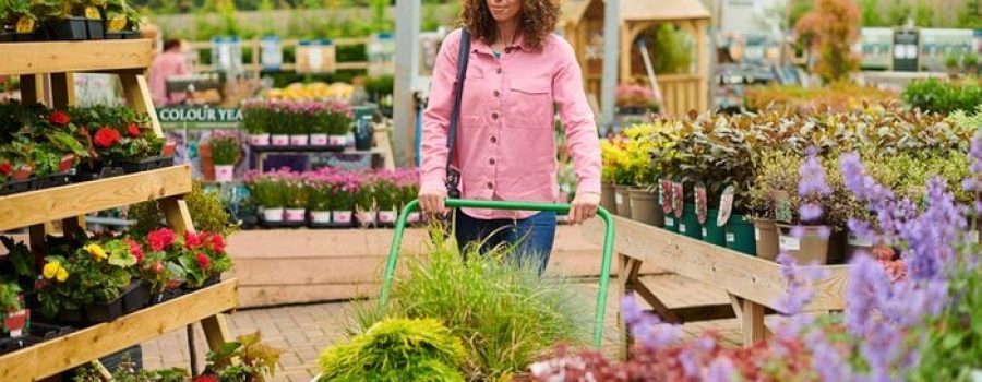 Woman walking through garden center