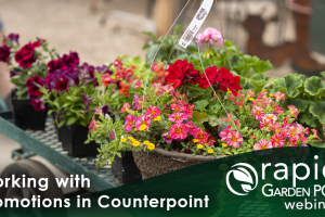 A garden center worker pulls a cart filled with colorful potted flowers and plants. Text: "Working with Promotions in Counterpoint" -- A Rapid Garden POS webinar.